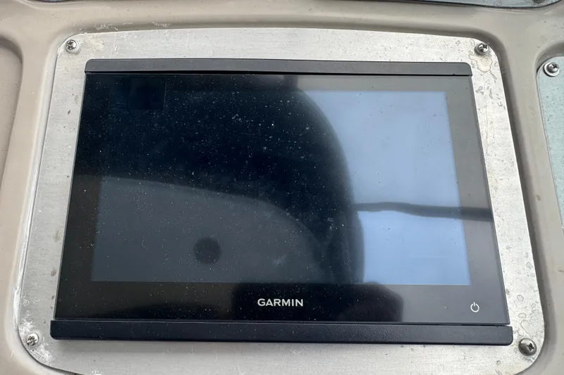 Slide: The Image of Garmin display on 2009 Chaparral Signature 250 boat dashboard. - 27