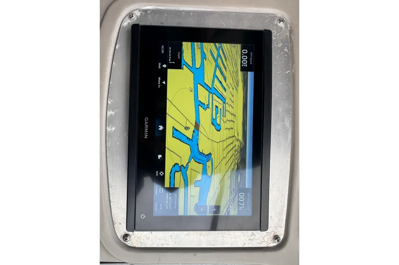 Slide: The Image of Garmin navigation display on 2009 Chaparral Signature 250 boat dashboard. - 28