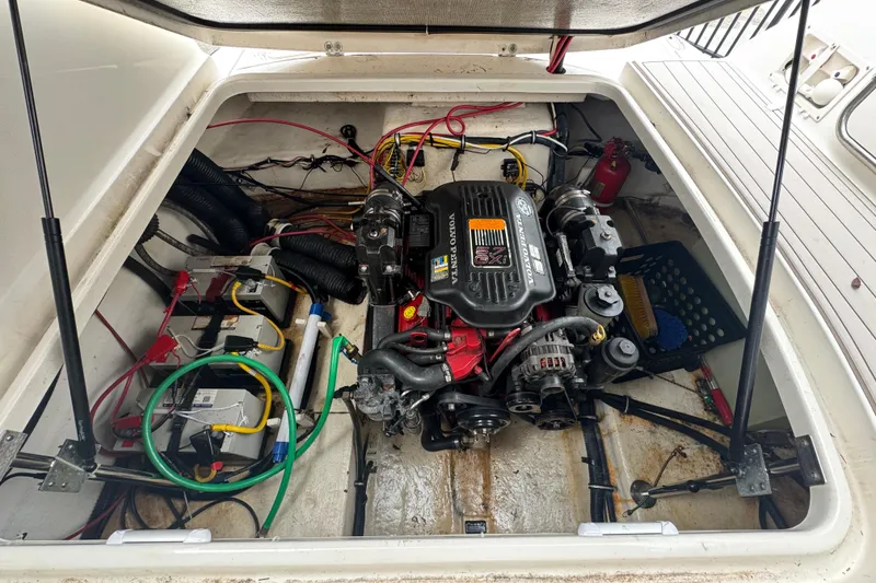 Slide: The Image of Engine compartment of a 2009 Chaparral Signature 250 boat with Volvo Penta engine. - 44