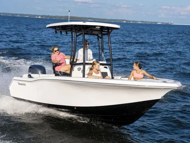 The Image of Tidewater 210 LXF 2026 boat on water with passengers. - 1