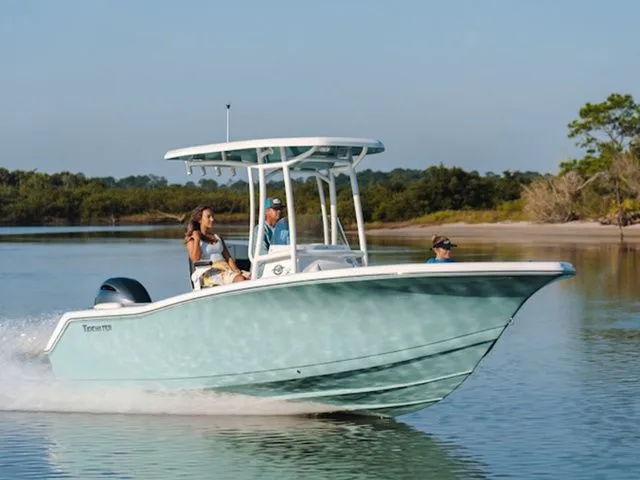 The Image of 2026 Tidewater 220 LXF boat cruising on calm water. - 1