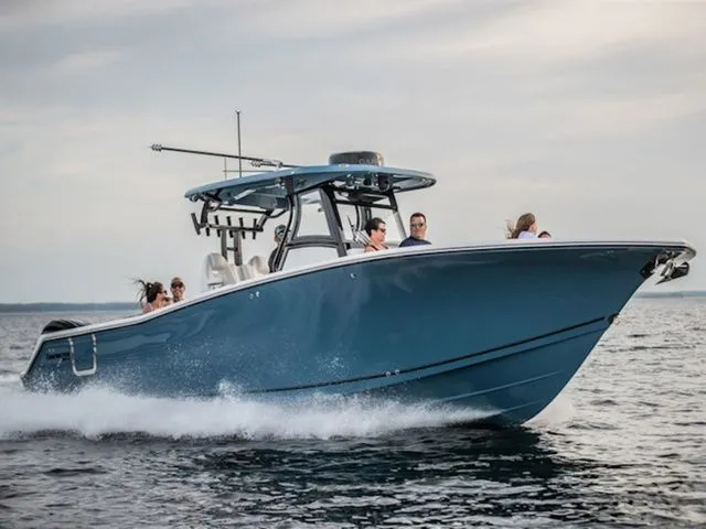 The Image of 2026 Tidewater 302 CC Adventure boat on the water. - 1