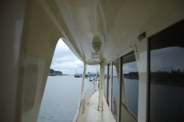 Slide: The Image of 1982 Kong & Halvorsen Island Gypsy yacht on calm waters. - 11