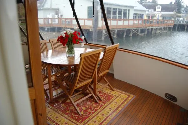 Slide: The Image of Dining area on a 1982 Kong & Halvorsen Island Gypsy yacht. - 12