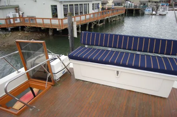Slide: The Image of 1982 Kong & Halvorsen Island Gypsy yacht with deck view and seating area. - 18