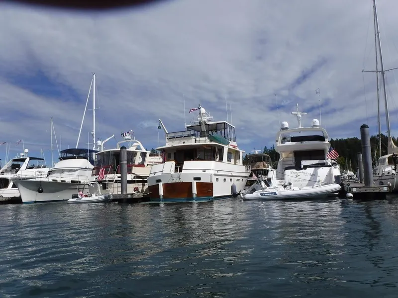 Slide: The Image of 1982 Kong & Halvorsen Island Gypsy yacht docked at marina. - 3