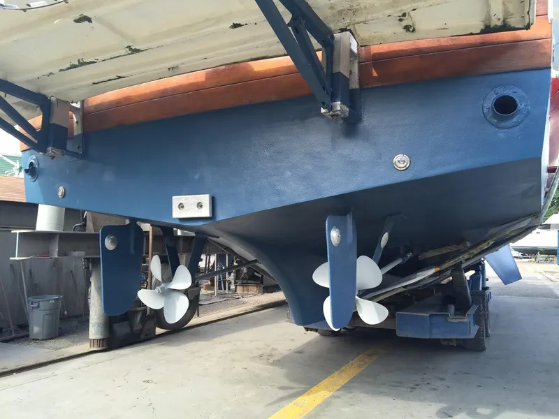 Slide: The Image of 1982 Kong & Halvorsen Island Gypsy yacht in dry dock, blue hull view. - 4
