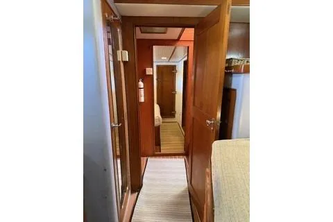 Slide: The Image of 1982 Kong & Halvorsen Island Gypsy interior hallway with wooden doors and cozy decor. - 46