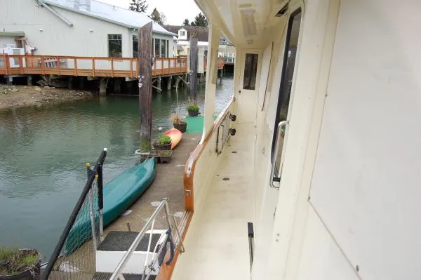 Slide: The Image of 1982 Kong & Halvorsen Island Gypsy yacht docked with waterfront view. - 5