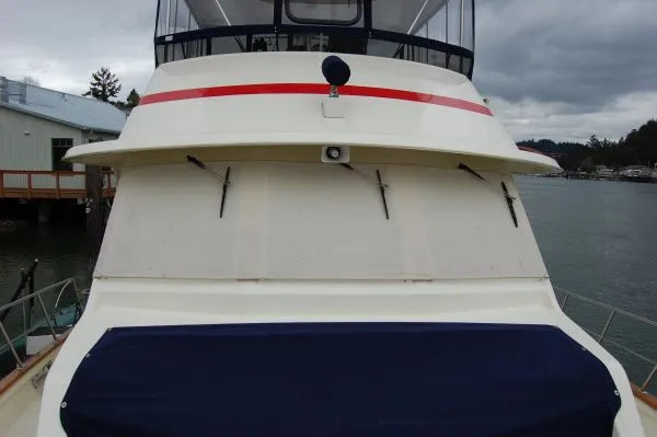 Slide: The Image of 1982 Kong & Halvorsen Island Gypsy yacht at dock. - 6