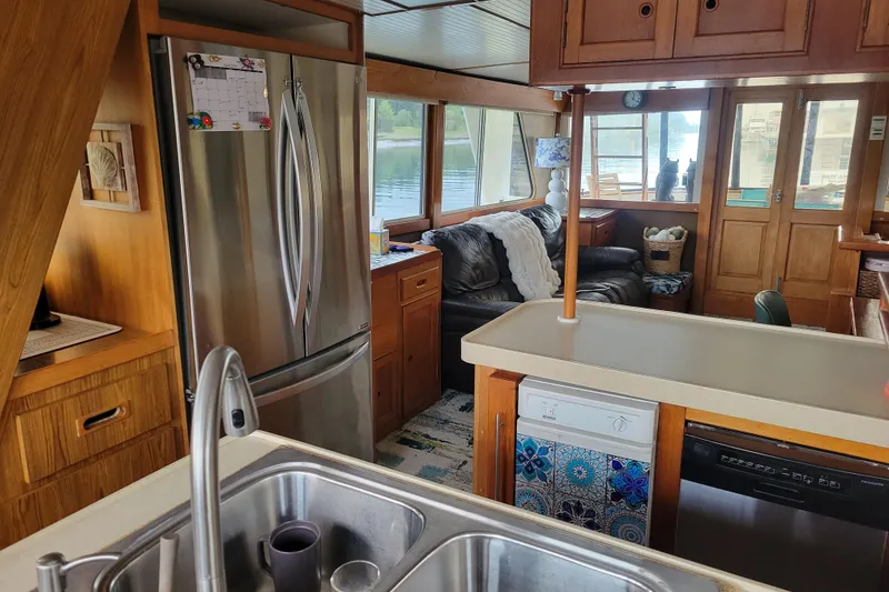 Slide: The Image of Interior of 1982 Kong & Halvorsen Island Gypsy yacht with kitchen and lounge area. - 66