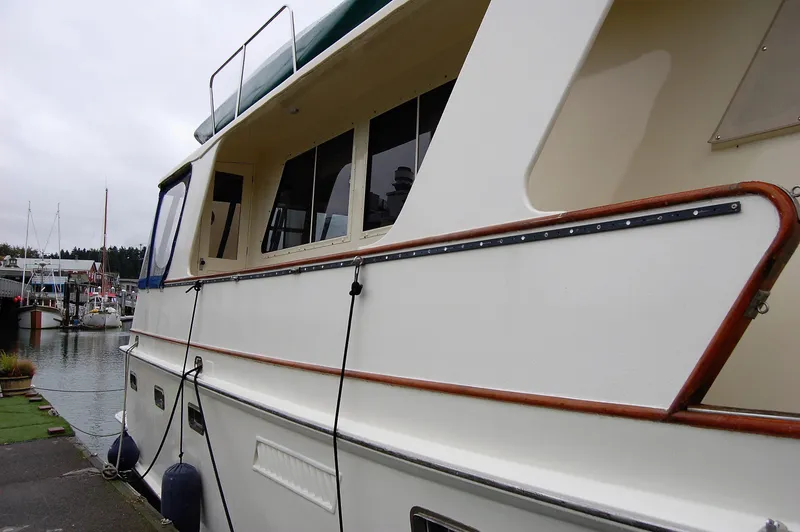 Slide: The Image of 1982 Kong & Halvorsen Island Gypsy yacht at dock. - 7