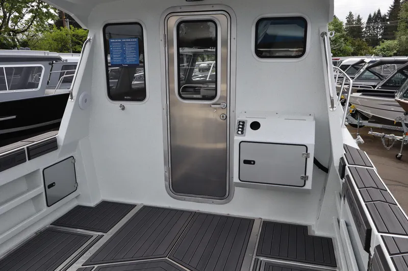 Slide: The Image of Interior view of 2026 KingFisher 3025 XRS boat with sleek design and modern features. - 5