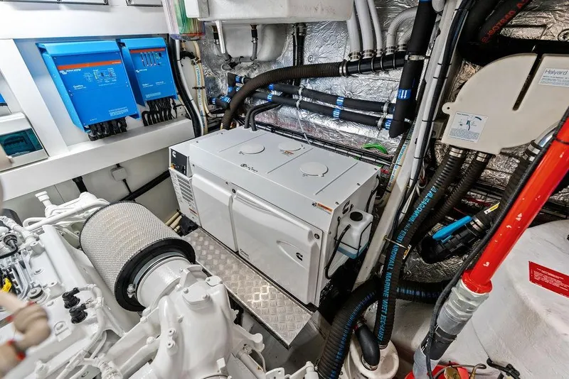 Slide: The Image of Engine room of 2026 Sunseeker 88 Yacht, featuring advanced machinery and wiring systems. - 109