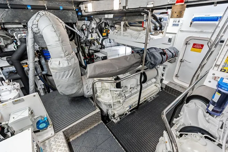 Slide: The Image of Engine room of 2026 Sunseeker 88 Yacht, showcasing advanced machinery and equipment. - 114