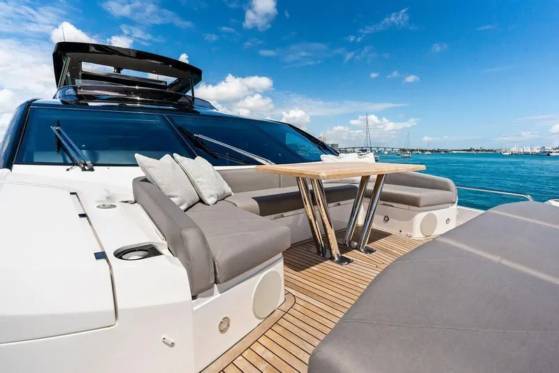 Slide: The Image of Luxurious Sunseeker 88 Yacht 2026 with elegant deck seating and ocean view. - 13