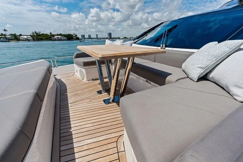 Slide: The Image of Luxurious Sunseeker 88 Yacht 2026 deck with elegant seating and ocean view. - 14