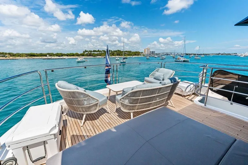 Slide: The Image of Luxurious Sunseeker 88 Yacht 2026 deck with ocean view and comfortable seating. - 20