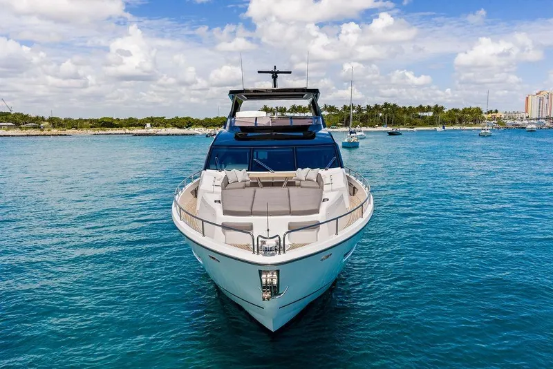 Slide: The Image of Luxurious 2026 Sunseeker 88 Yacht on clear blue water, showcasing sleek design and elegance. - 3