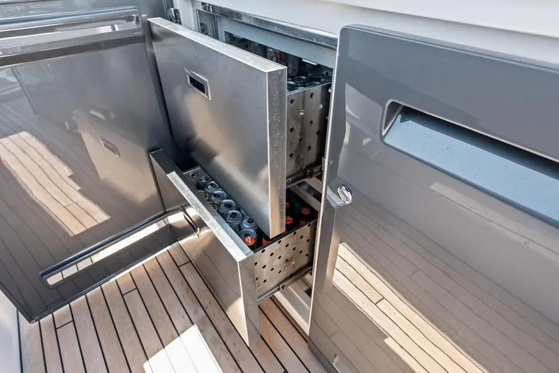 Slide: The Image of Built-in beverage cooler on 2026 Sunseeker 88 Yacht, featuring sleek design and ample storage. - 35