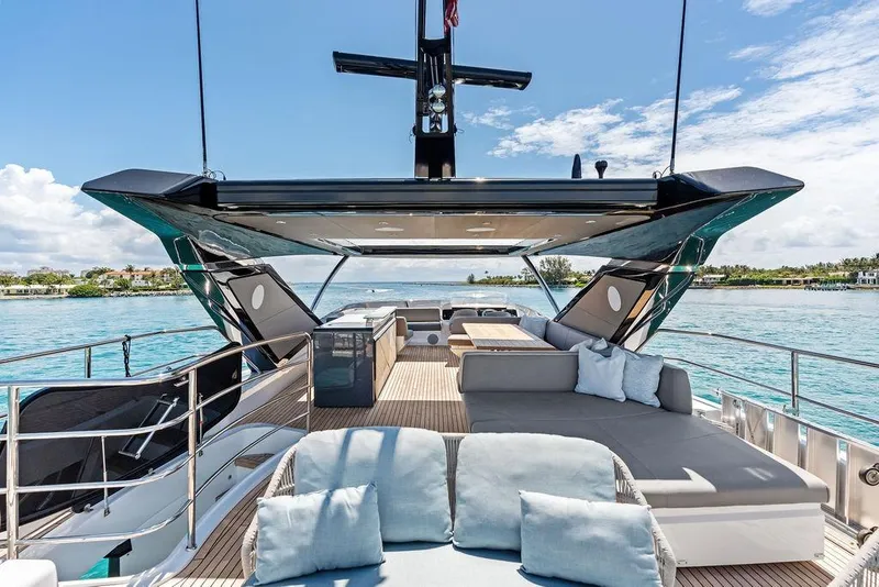 Slide: The Image of Luxurious Sunseeker 88 Yacht 2026 with spacious deck and elegant seating, cruising on clear waters. - 38