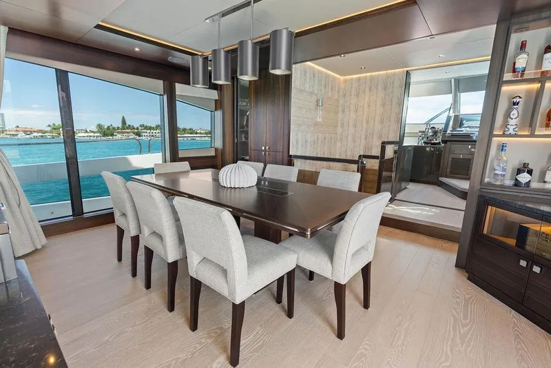Slide: The Image of Luxurious dining area on 2026 Sunseeker 88 Yacht with ocean view and elegant decor. - 48