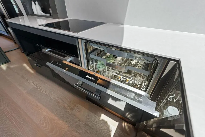 Slide: The Image of Modern kitchen with Miele dishwasher on Sunseeker 88 Yacht, 2026 model. - 56