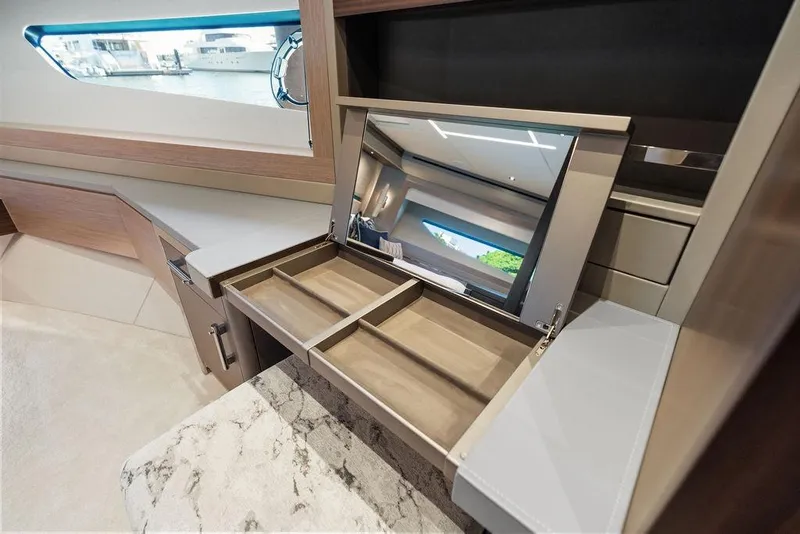 Slide: The Image of Luxurious interior of 2026 Sunseeker 88 Yacht with elegant vanity and mirror. - 65