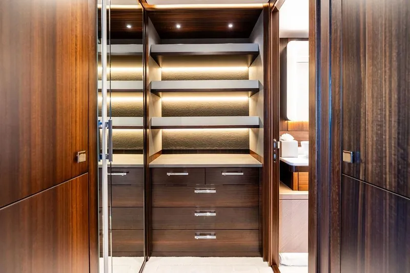 Slide: The Image of Luxurious wooden interior of 2026 Sunseeker 88 Yacht with elegant shelving and drawers. - 70