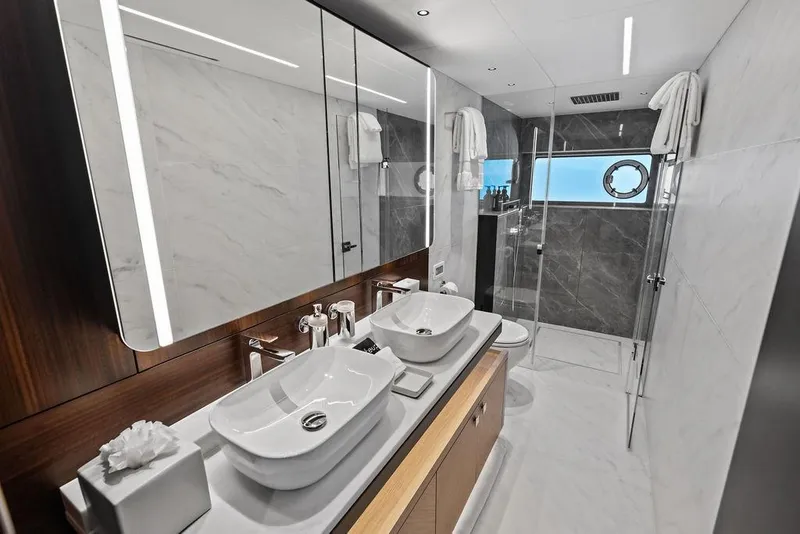 Slide: The Image of Luxurious bathroom in 2026 Sunseeker 88 Yacht with modern fixtures and elegant design. - 71