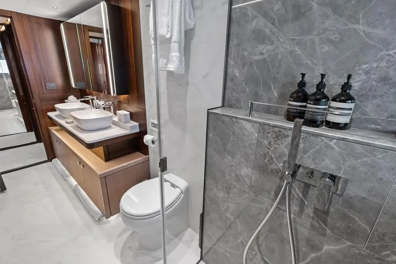 Slide: The Image of Luxurious bathroom on 2026 Sunseeker 88 Yacht with modern fixtures and elegant design. - 74