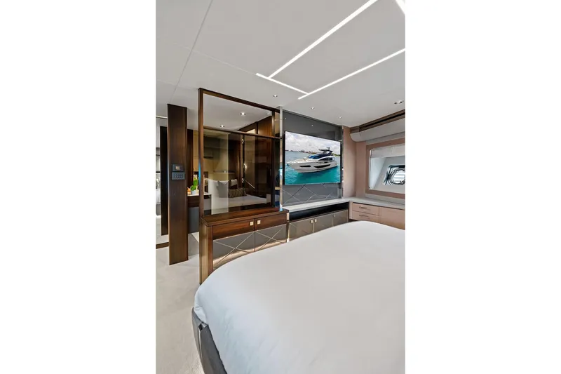 Slide: The Image of Luxurious interior of 2026 Sunseeker 88 Yacht, featuring elegant bedroom design. - 79