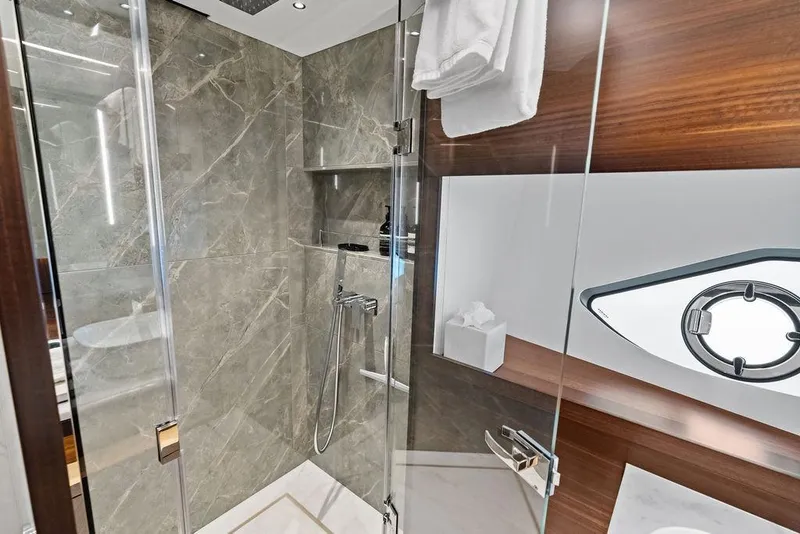 Slide: The Image of Luxurious bathroom in 2026 Sunseeker 88 Yacht with marble walls and modern fixtures. - 81