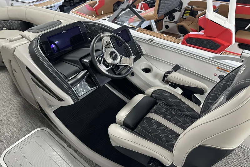 Slide: The Image of Luxurious 2026 Barletta Lusso boat interior with sleek steering and modern dashboard. - 6
