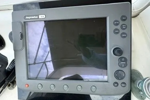 Slide: The Image of Small bathroom interior of 1980 Viking 43 Convertible yacht, featuring sink and toilet. - 19