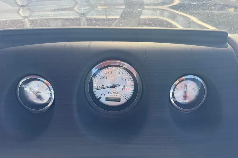 Slide: The Image of Dashboard gauges of a 2023 Bennington 188 SVF boat, displaying RPM and other metrics. - 9