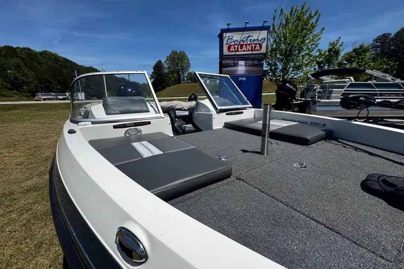 Slide: The Image of 2018 Ranger 212LS Reata boat displayed at Boating Atlanta dealership. - 8