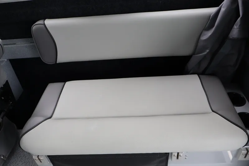 Slide: The Image of 2026 KingFisher 2825 Coastal Express interior seating, featuring sleek gray upholstery. - 11