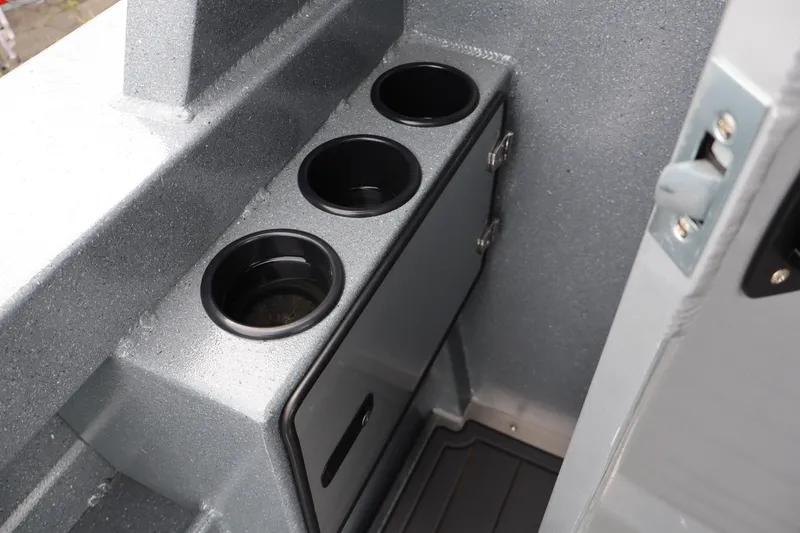 Slide: The Image of Cup holders on a 2026 KingFisher 2825 Coastal Express boat interior. - 9