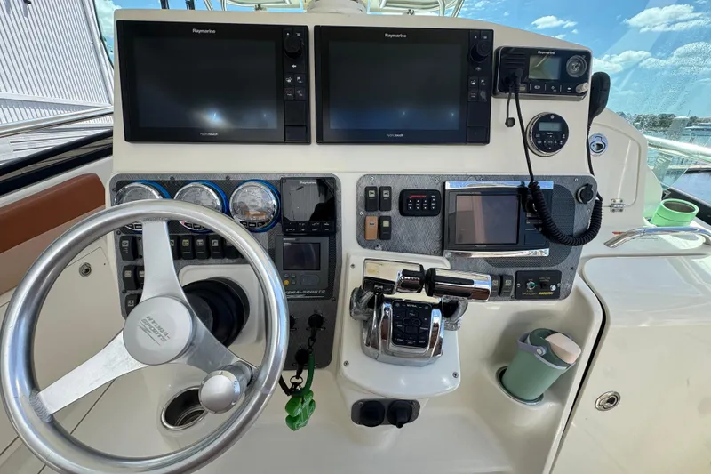 Slide: The Image of 2006 Hydra-Sports Vector 3300 VX helm with dual Raymarine displays and controls. - 14