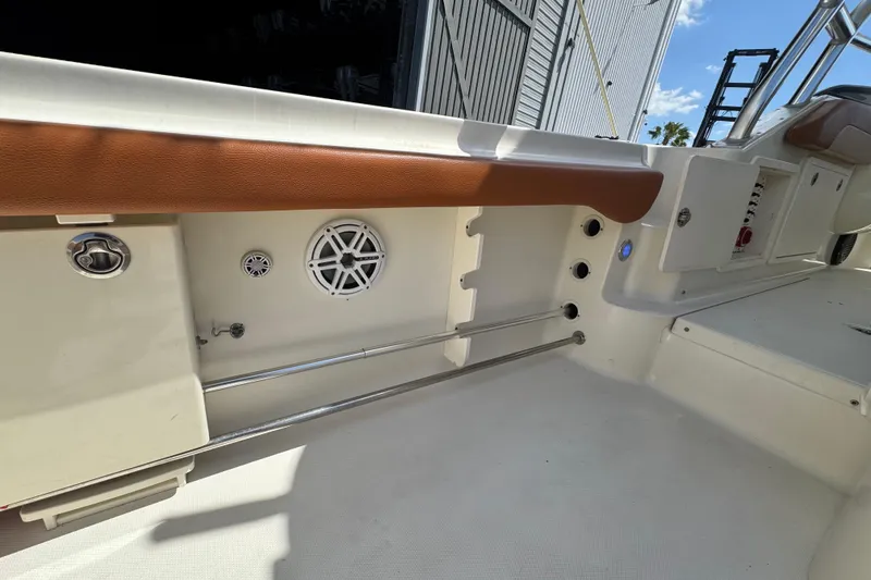 Slide: The Image of 2006 Hydra-Sports Vector 3300 VX boat interior with speaker and control panel. - 17