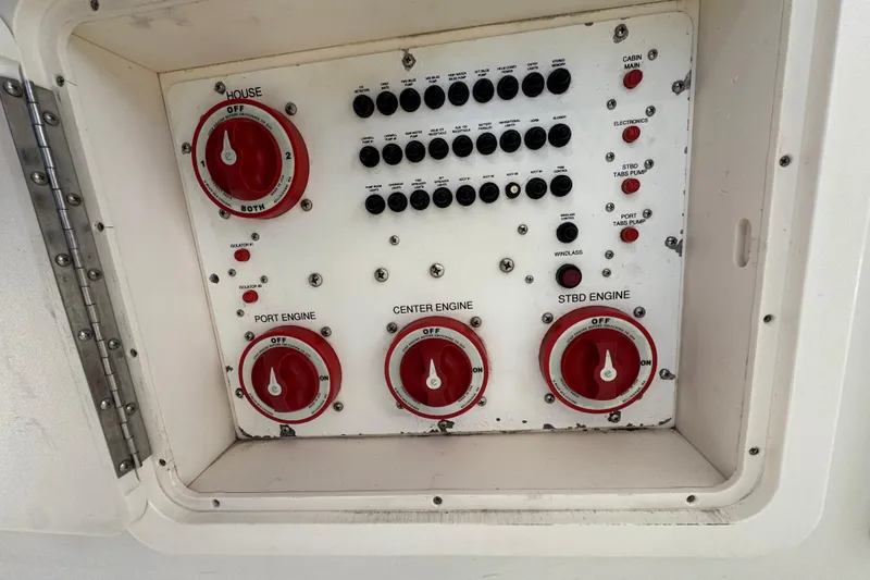 Slide: The Image of Control panel of a 2006 Hydra-Sports Vector 3300 VX boat with engine switches. - 18