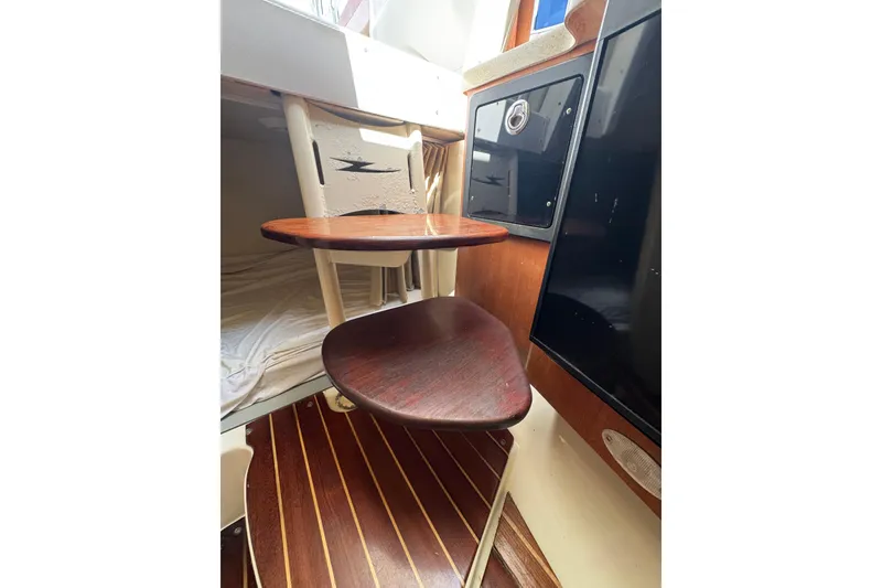 Slide: The Image of Interior of 2006 Hydra-Sports Vector 3300 VX with wooden steps and cabin features. - 29