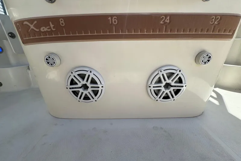 Slide: The Image of 2006 Hydra-Sports Vector 3300 VX boat speakers and ruler detail on deck. - 34