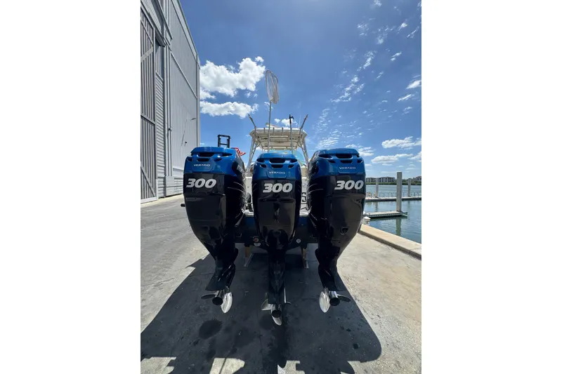 Slide: The Image of 2006 Hydra-Sports Vector 3300 VX with triple 300 horsepower Verado engines at dock. - 9