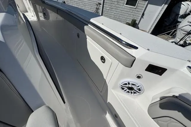 Slide: The Image of 2026 Pursuit S 328 Sport boat interior with sleek design and modern features. - 24