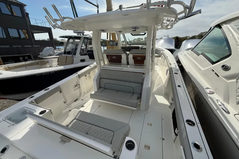 Slide: The Image of 2026 Pursuit S 328 Sport boat interior with seating and helm station. - 38