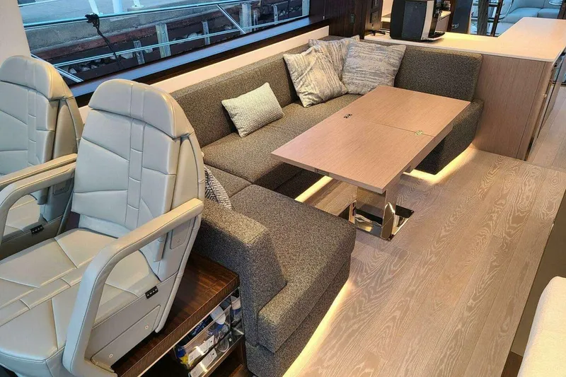 Slide: The Image of Luxurious interior of 2023 Sunseeker Manhattan 68 yacht with plush seating and modern design. - 11