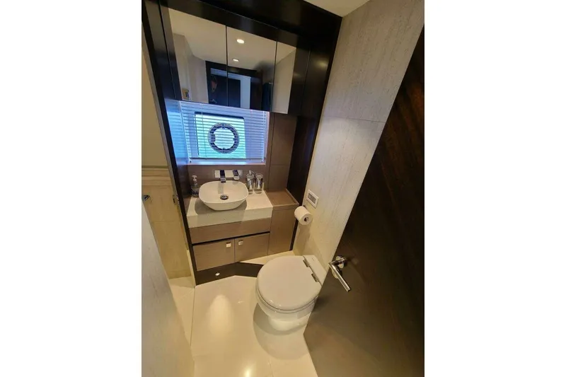 Slide: The Image of Luxurious bathroom in 2023 Sunseeker Manhattan 68 yacht, featuring modern fixtures and elegant design. - 40
