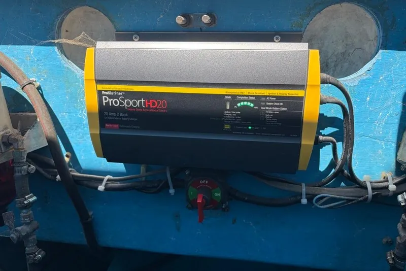 Slide: The Image of ProSport HD20 battery charger mounted on a blue Wilson 24 boat, model year 1976. - 10